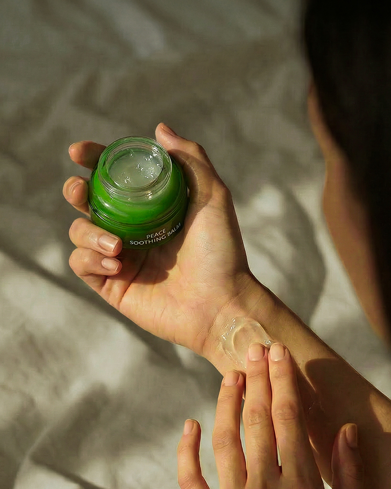 Hands holding Spa Ceylon Peace soothing balm